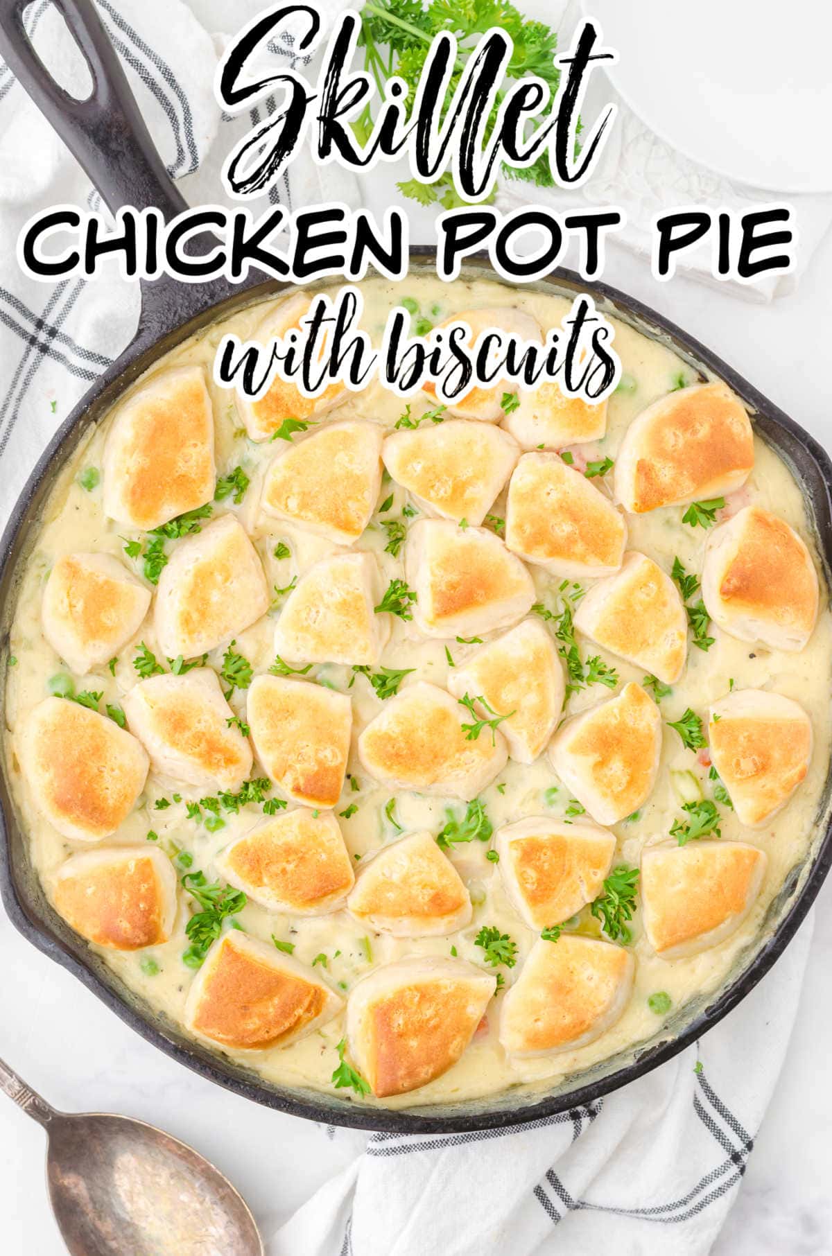 Overhead view of chicken pot pie skillet with text overlay