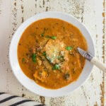 Overhead view of soup in a bowl.