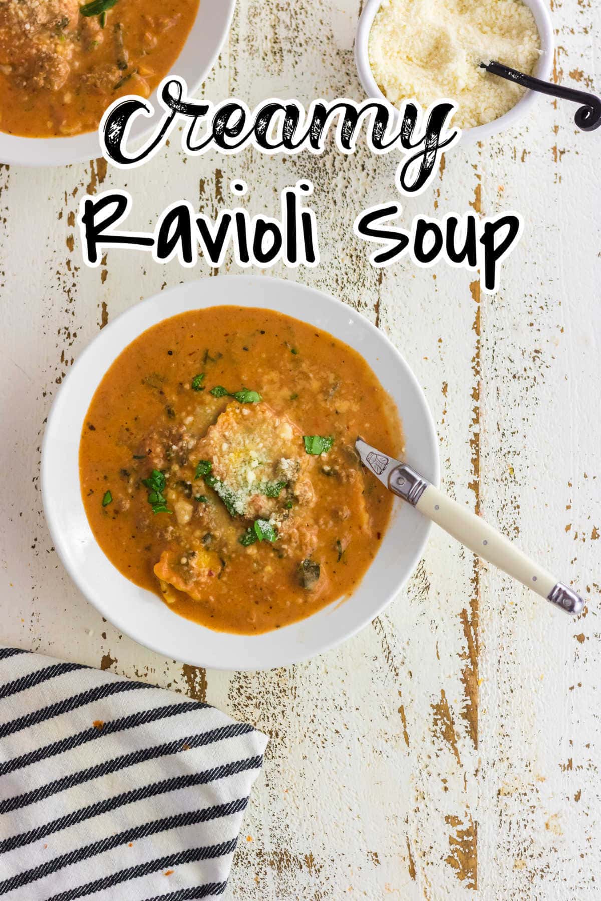 Soup on the table garnished with Parmesan cheese. Title text overlay.