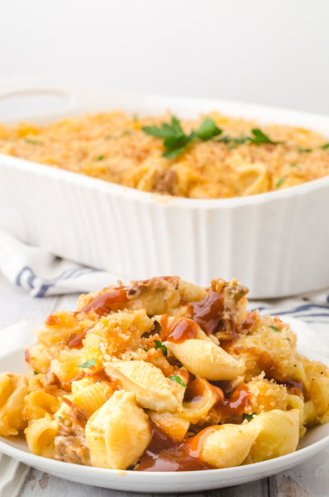 A plate of pulled pork mac and cheese.