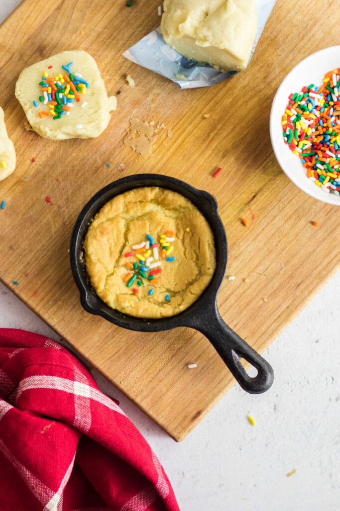 Overhead view of a finished cookie in a small skillet.