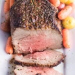 Sliced bottom round roast with text overlay for Pinterest.
