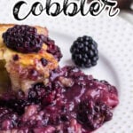 Closeup of cobbler on a plate with text overlay for Pinterest.