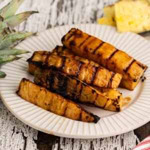 Close up of grilled pineapple showing grill marks.