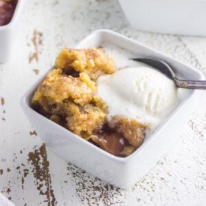 Closeup of a serving of the apple dump cake for the feature image.