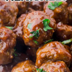 Meatballs in a serving bowl with a text overlay for Pinterest.