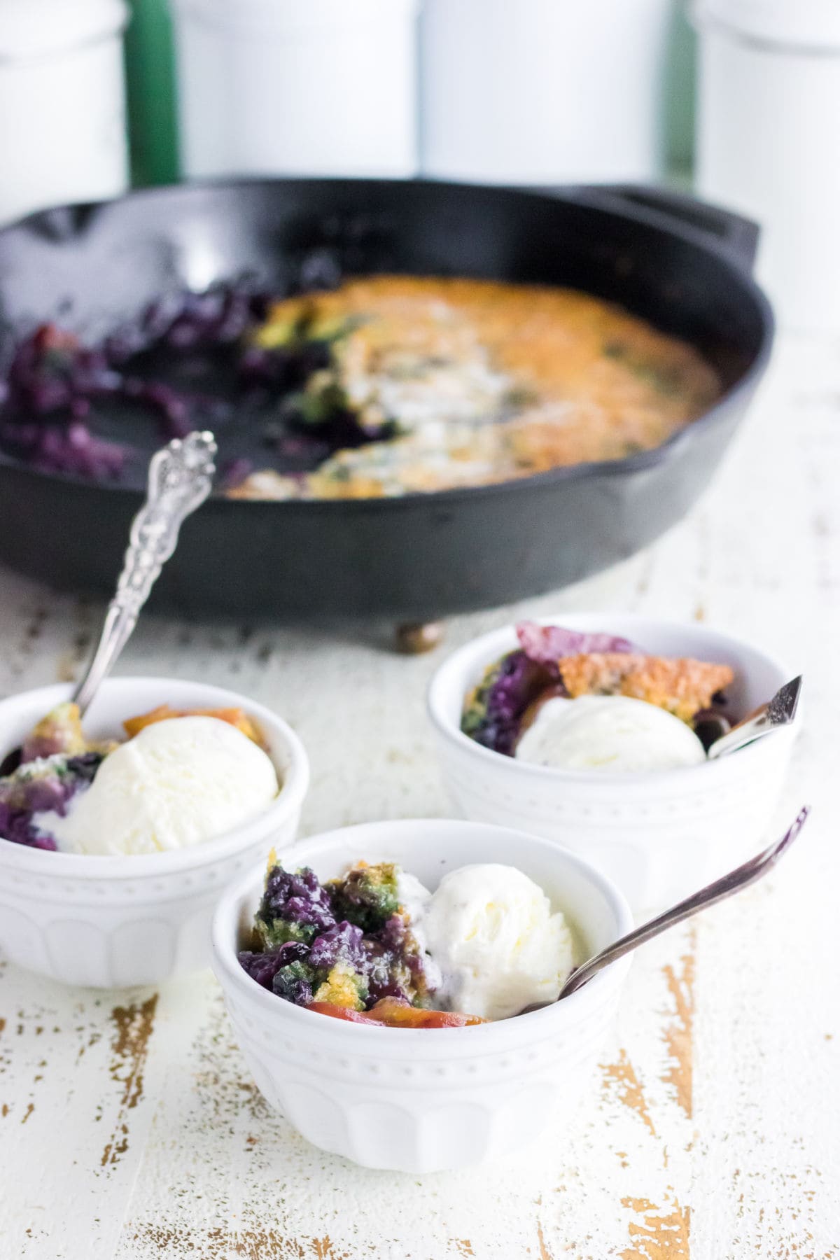 Servings of cobbler and ice cream in a bowl.