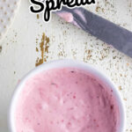 A bowl of strawberry cream cheese with text overlay for Pinterest- alternate pin.
