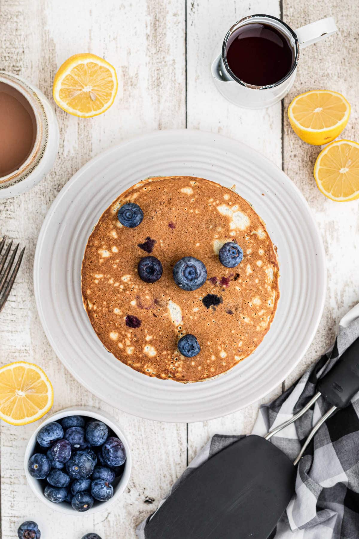 Overhead view of blueberry pancakes.