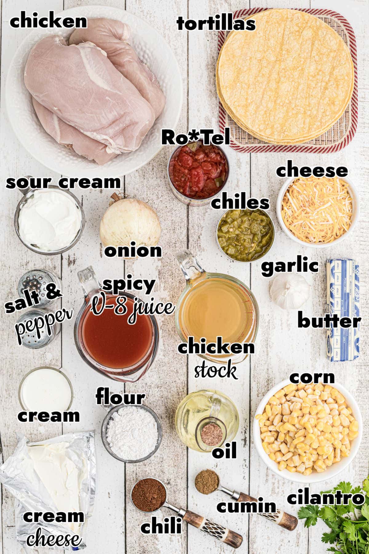 Ingredients for chicken enchiladas on a table.
