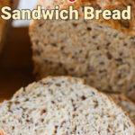 Slice of flaxseed bread with text overlay for Pinterest.