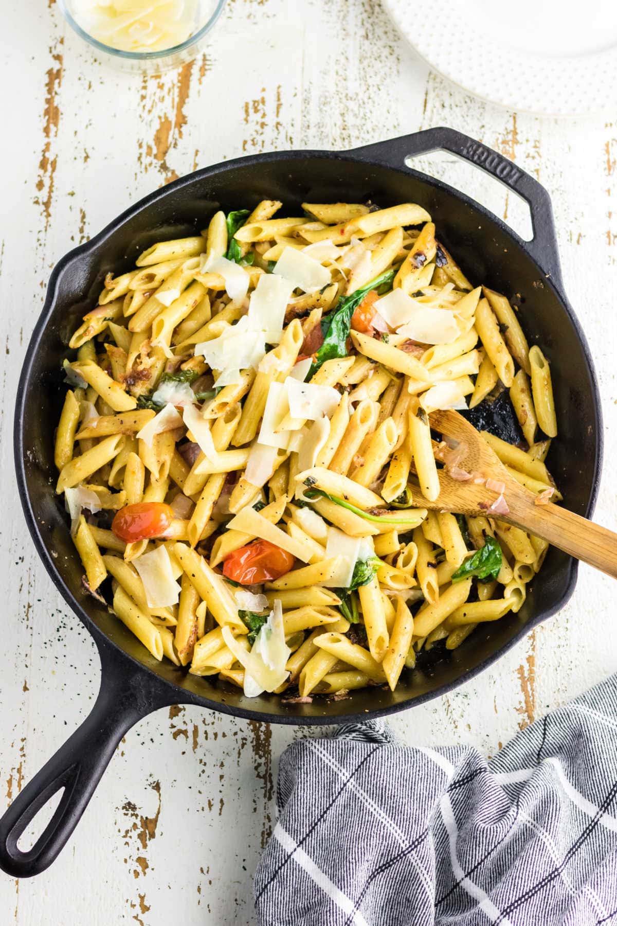 Overhead view of pasta in an iron skillet.