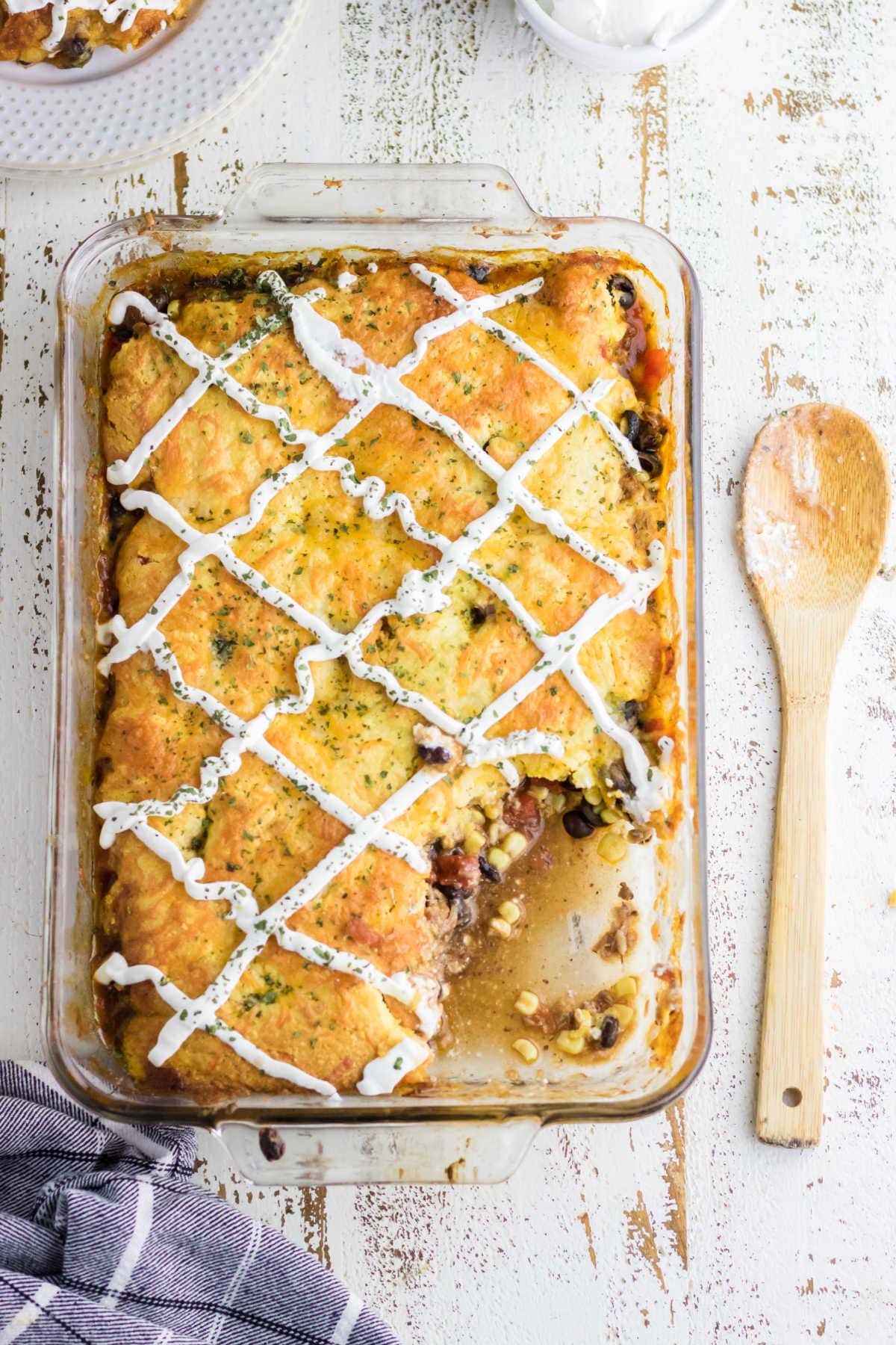 Overhead view of pulled pork casserole with serving removed.