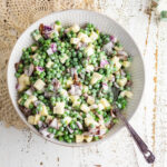 Overhead view of a bowl of pea salad