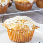 Closeup of a muffin on a plate with text overlay for Pinterest.
