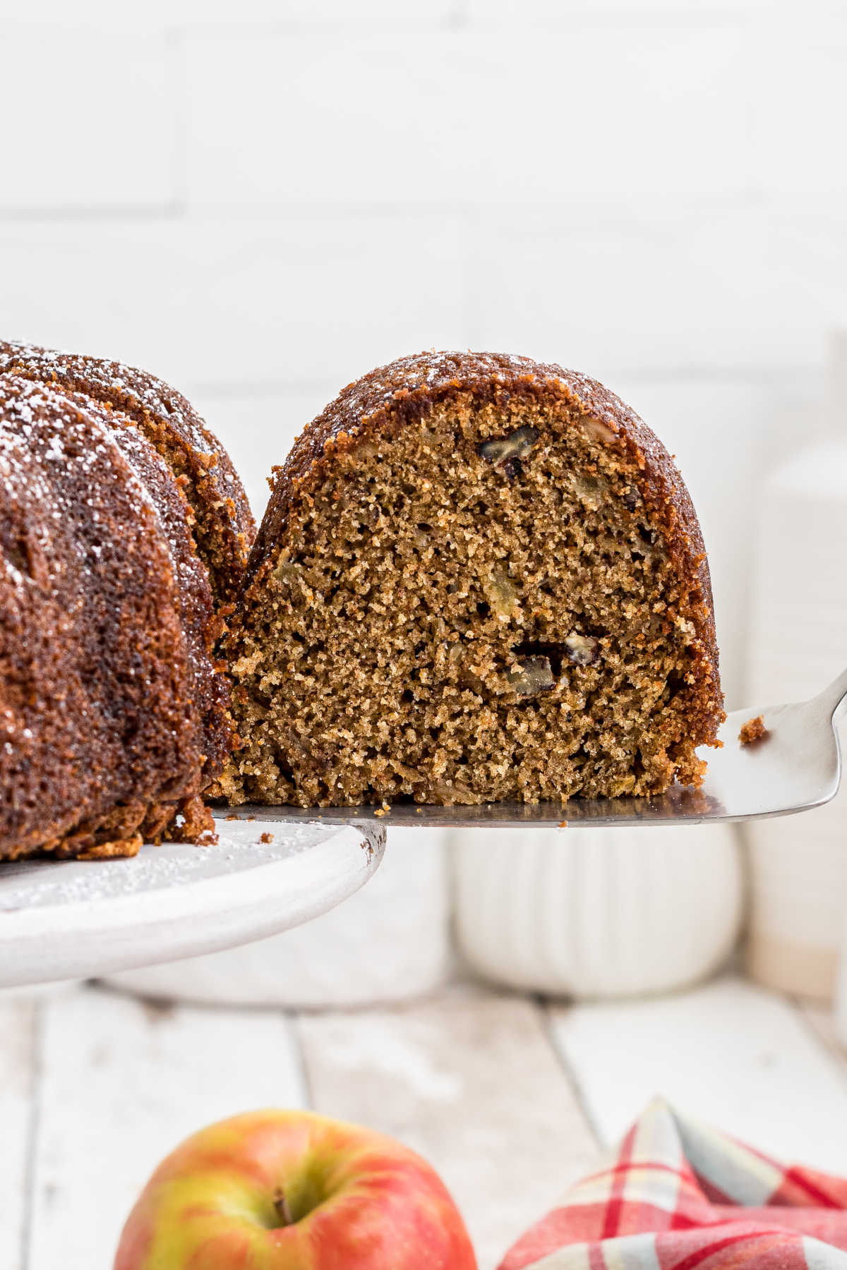 A slice of apple bundt cake.