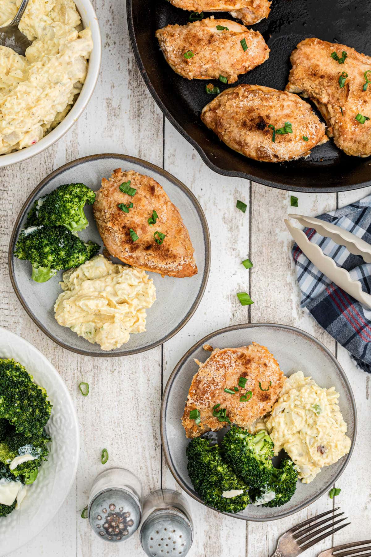 Overhead view of deviled chicken being served.