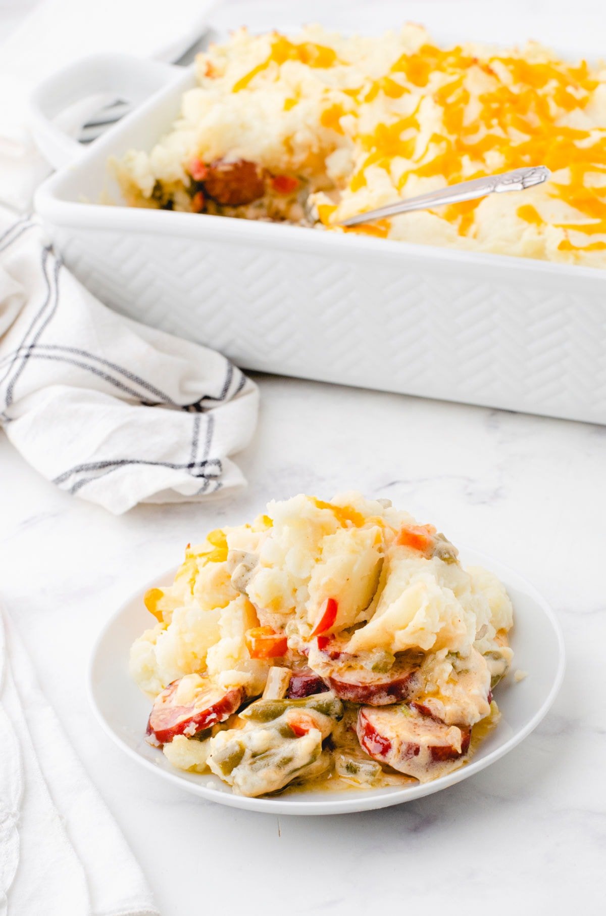 A serving of this shepherd's pie on a white plate.