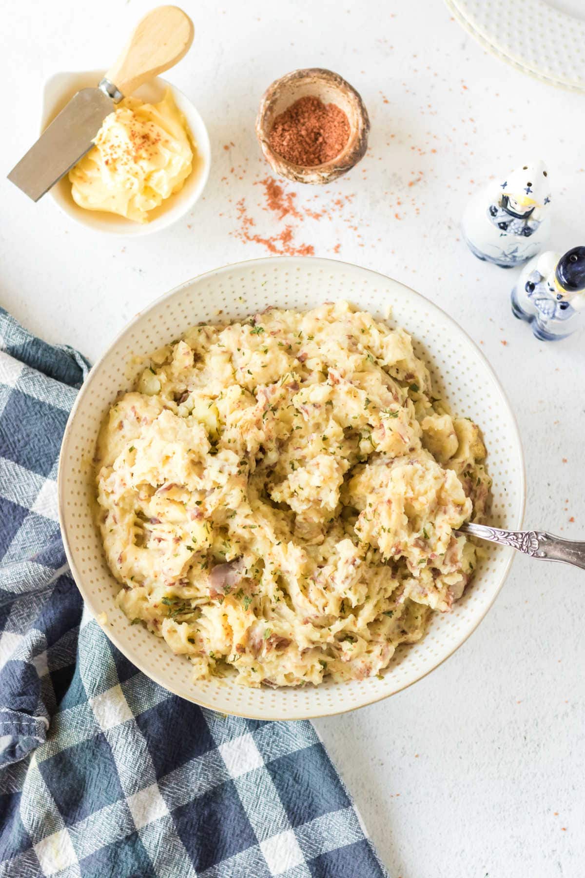 Overhead view of mashed potatoes in a bowl.