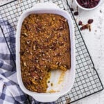 Overhead view of pumpkin baked oatmeal in a casserole dish.