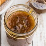 Jezebel sauce in a jar with text overlay for Pinterest.