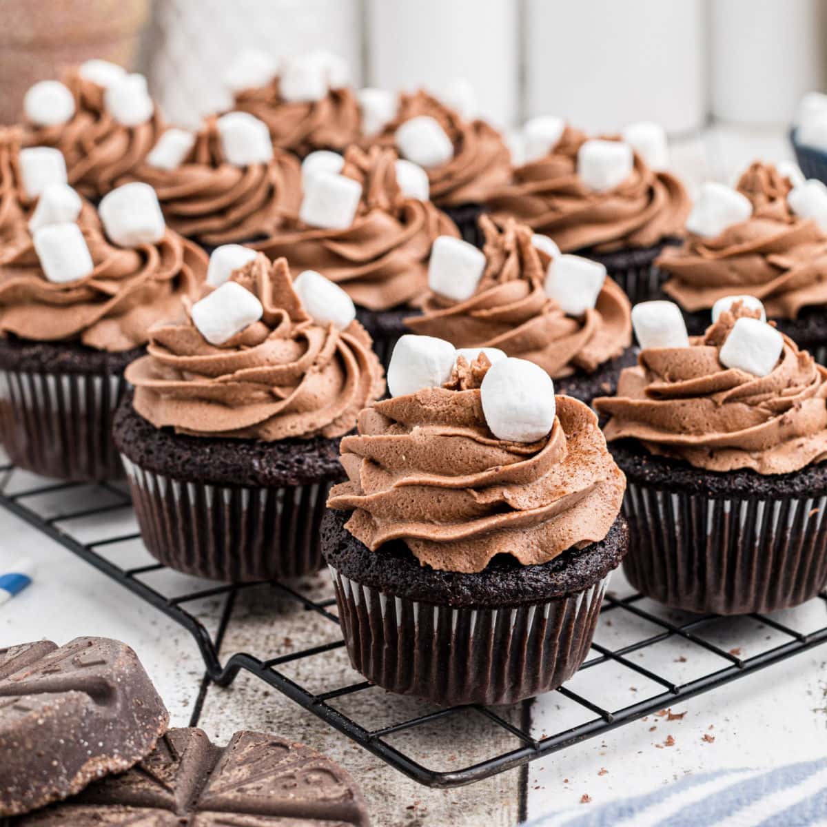 Close up of the cupcakes on a cooling rack for feature image.