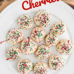 Overhead view of chocolate covered cherries decorated for the holidays.