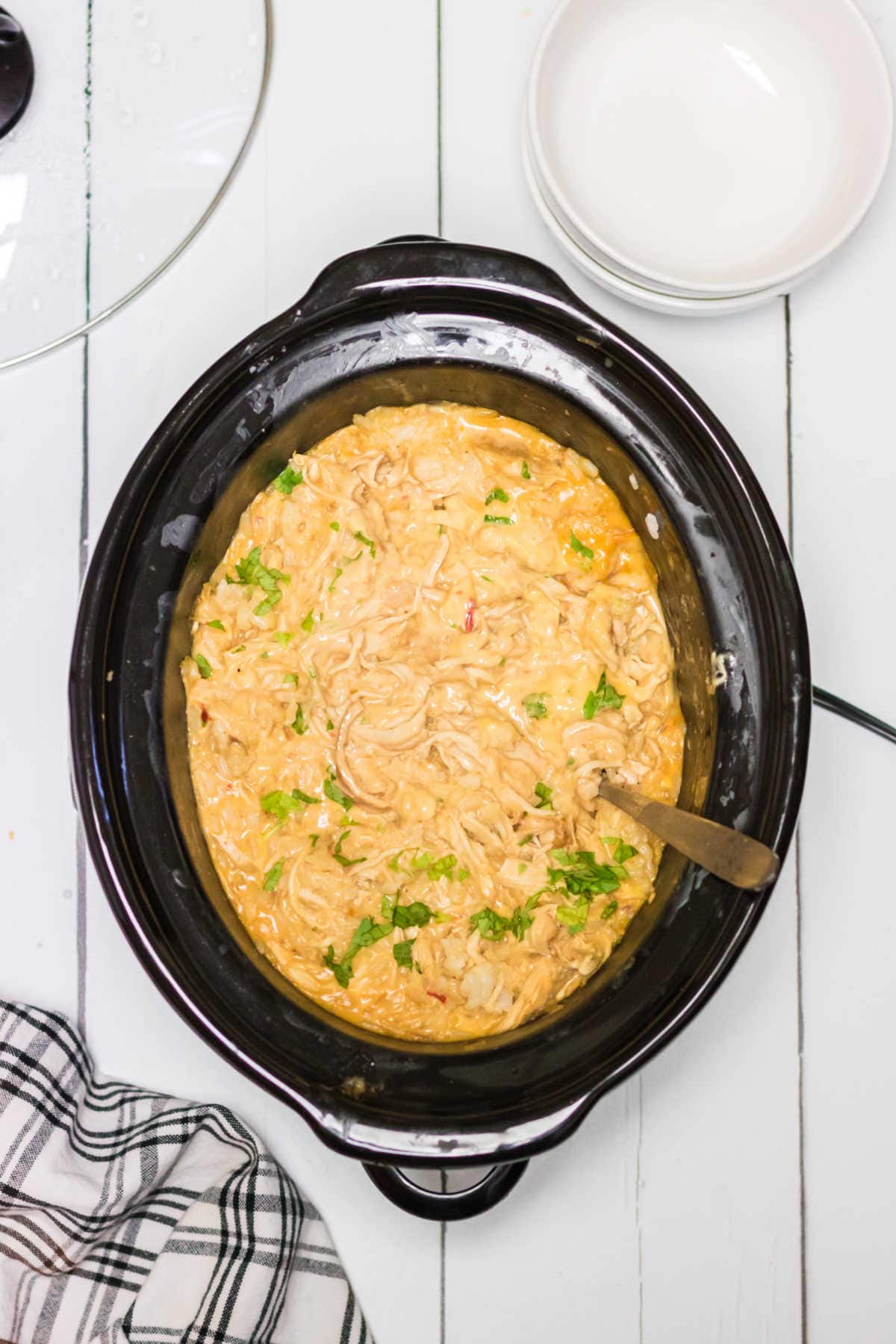 Overhead view of the finished chicken and rice in the crockpot.