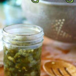 Pickled jalapenos in a jar with text overlay for Pinterest.