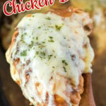 A serving spoon with cheesy French onion chicken on it being removed from a slow cooker. Text overlay for Pinterest.