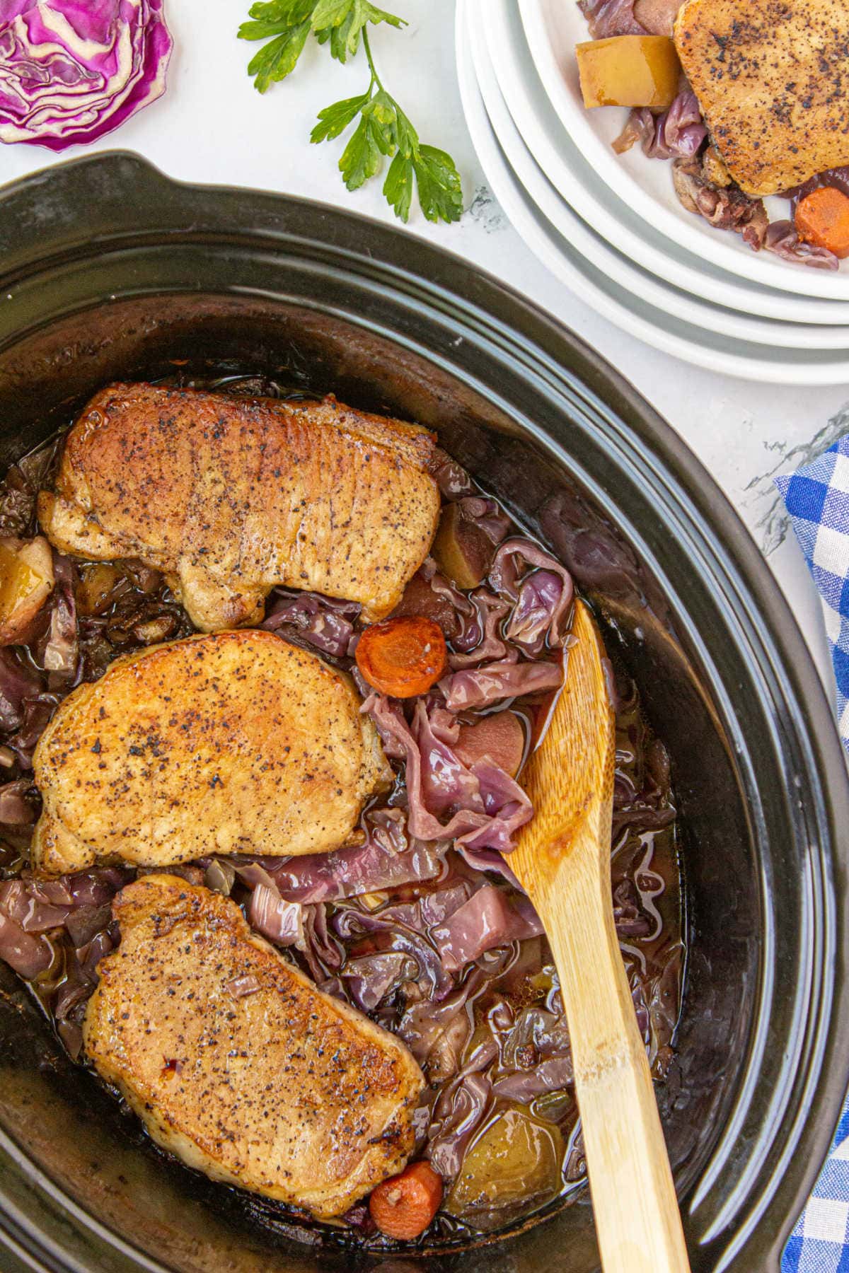 Braised pork and red cabbage mixed up in pot