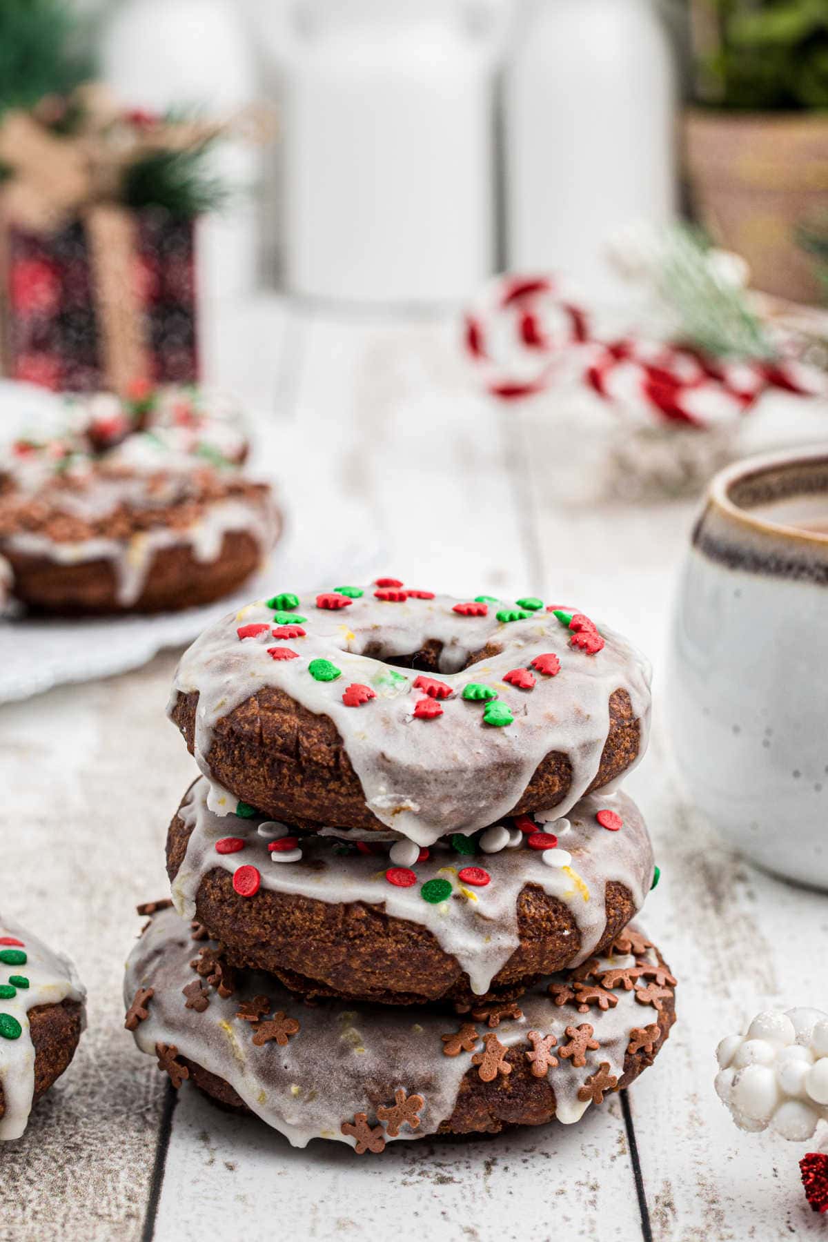 Three gingerbread donuts stacked on top of each other.