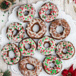 Overhead view of gingerbread donuts with text overlay for Pinterest.