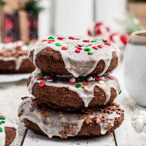 Three gingerbread donuts stacked on top of each other.