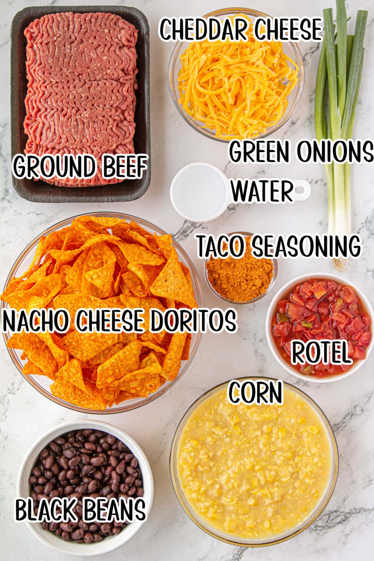 Overhead shot of labeled ingredients list for beef dorito casserole.