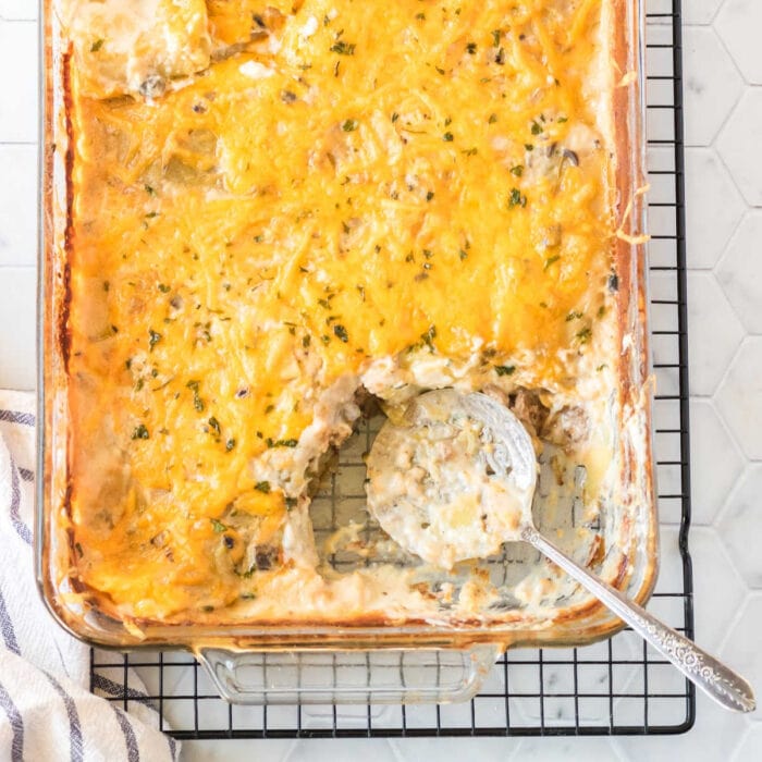 Overhead view of the casserole with a serving spoon in it.