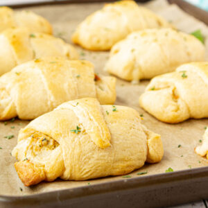 Closeup of finished crescent rolls for feature image.