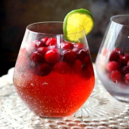 closeup of a bright red cranberry moscow mule cocktail.
