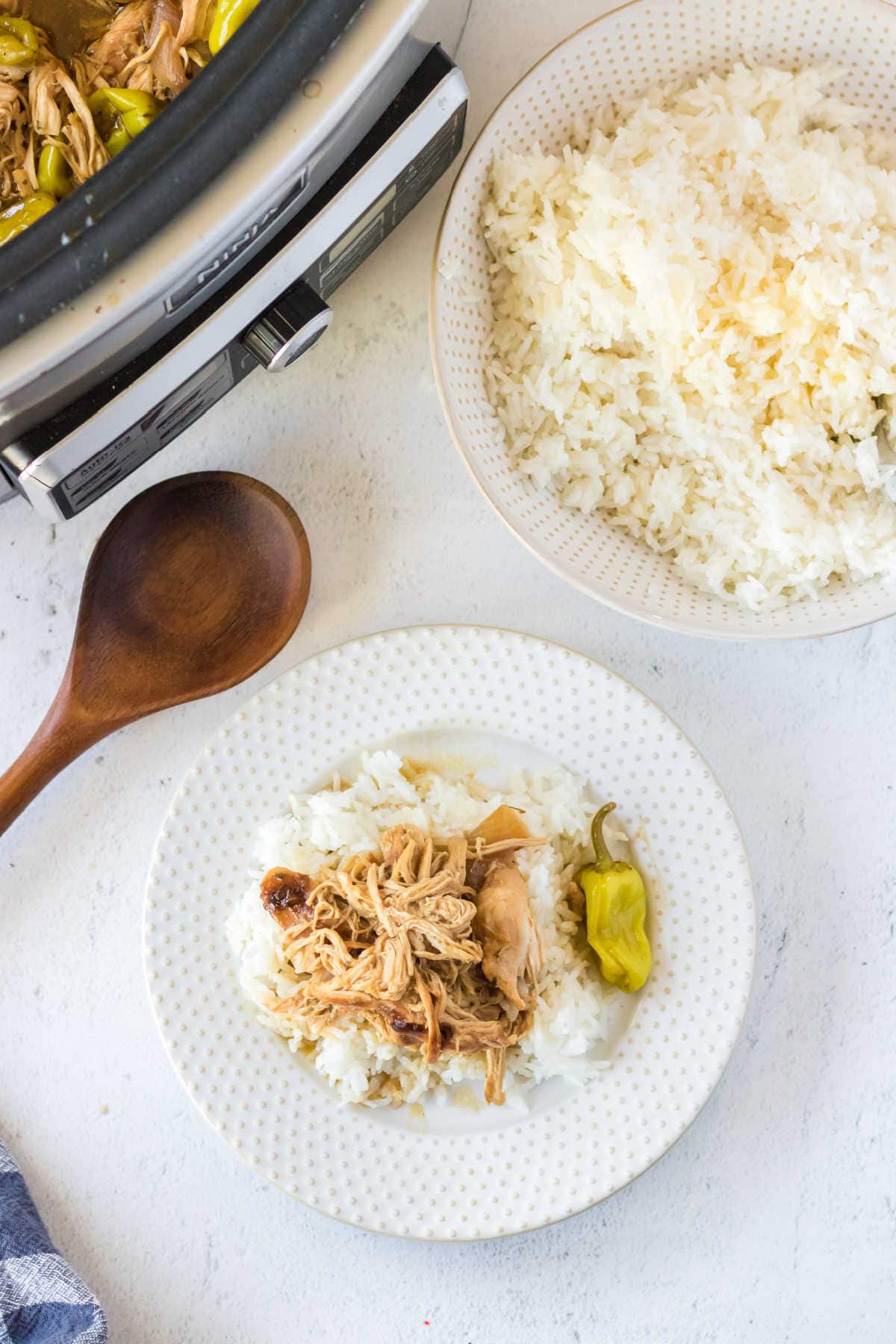 Mississippi chicken on white plate.