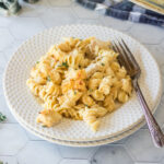 Angel Chicken Mac & Cheese on a white plate.