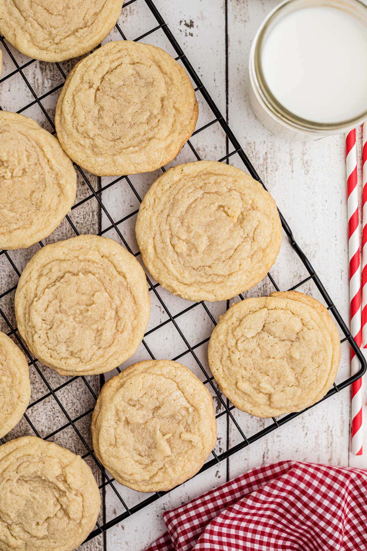 Golden brown sugar cookies on a wire rack.