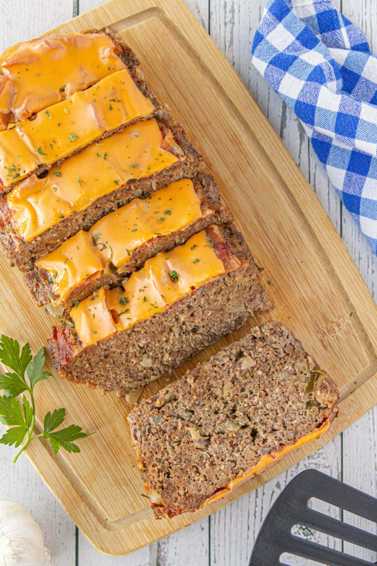 Overhead view of the meatloaf with melted cheese on top.