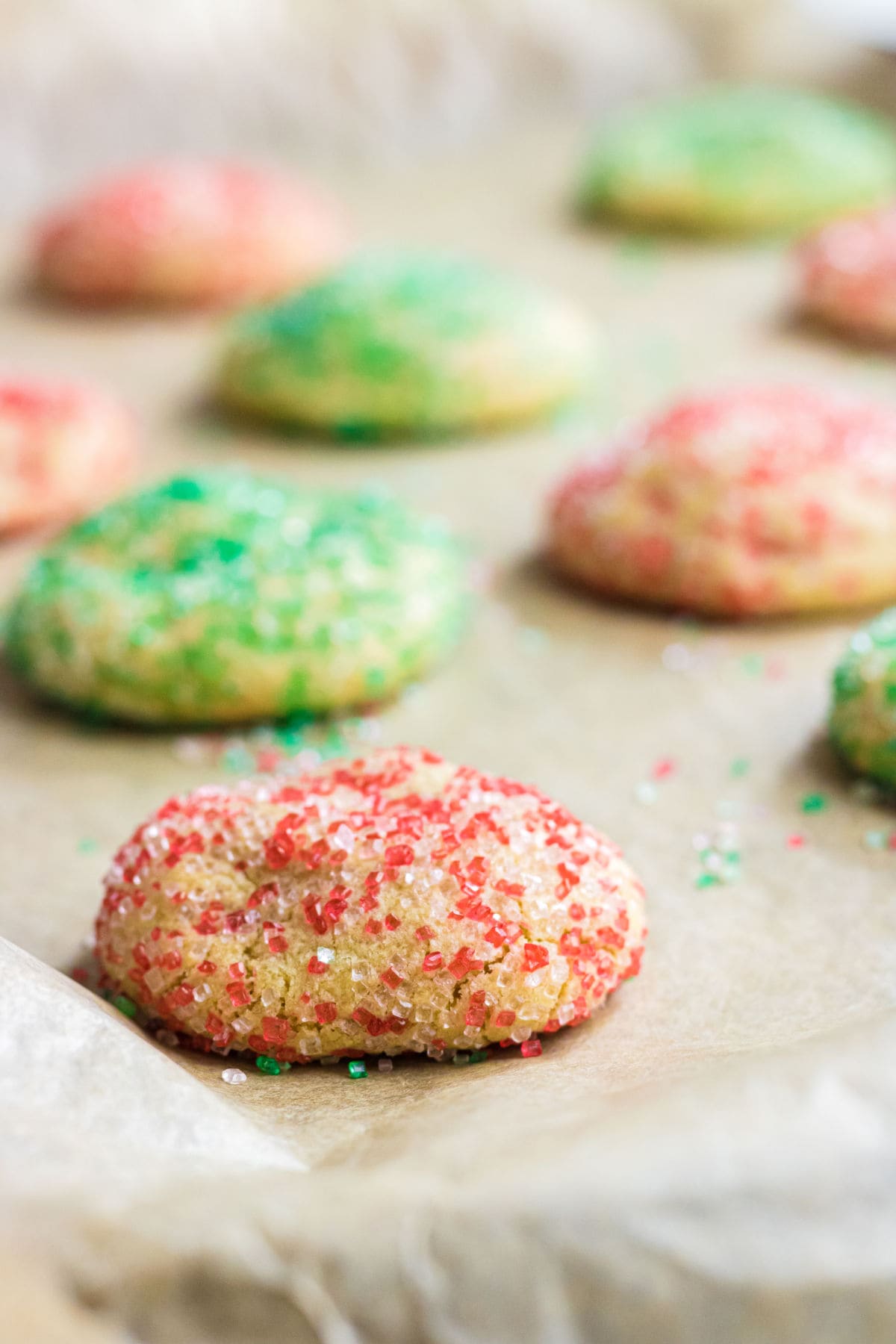 Closeup of Rolo cookies on a parchment covered baking sheet.