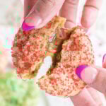 Broken cookie showing the gooey caramel insides.