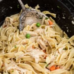 Square feature image of chicken and noodles.
