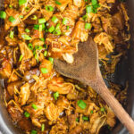 Closeup of the chicken in a crockpot for the feature image.