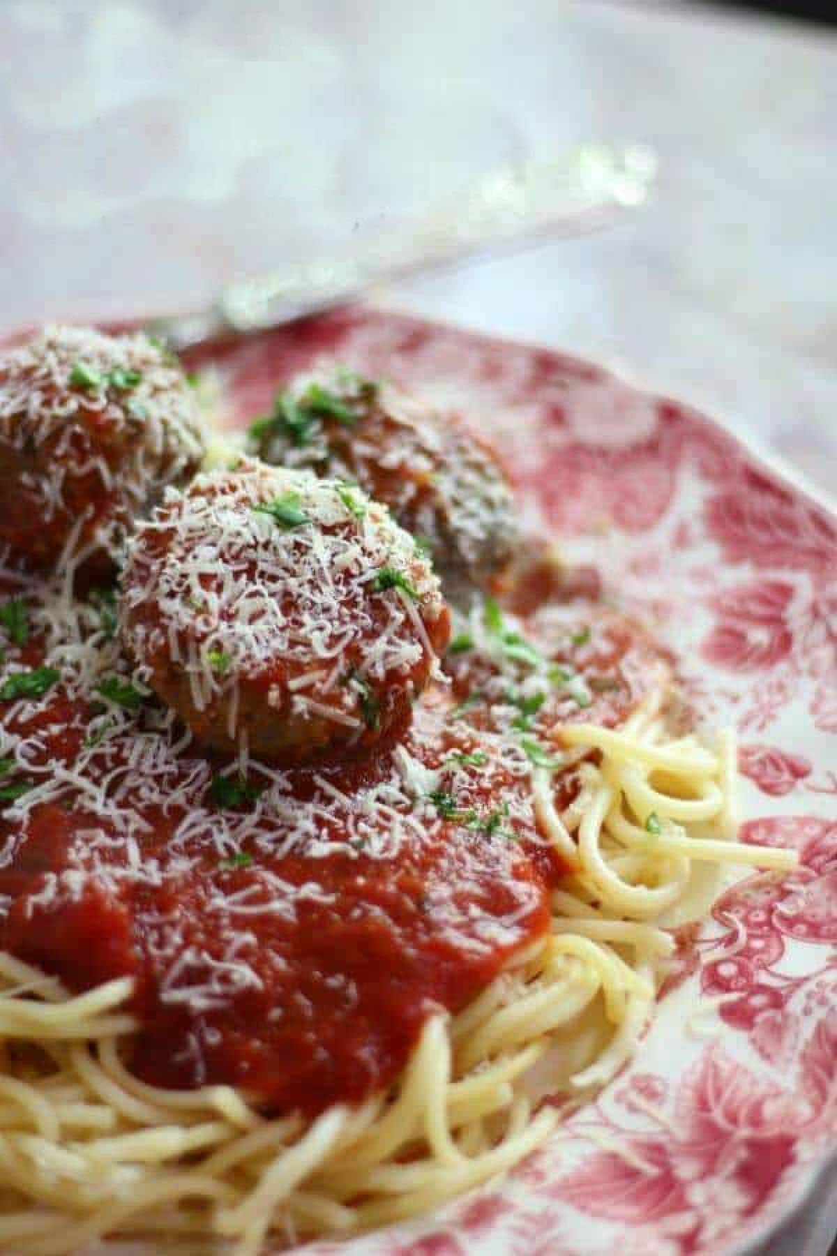 Finished meatballs on a plate.