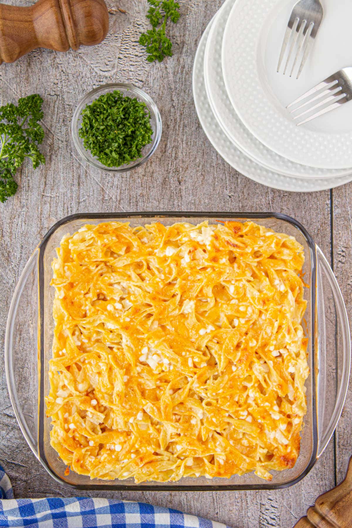 Overhead view of noodles romanoff in a baking dish.