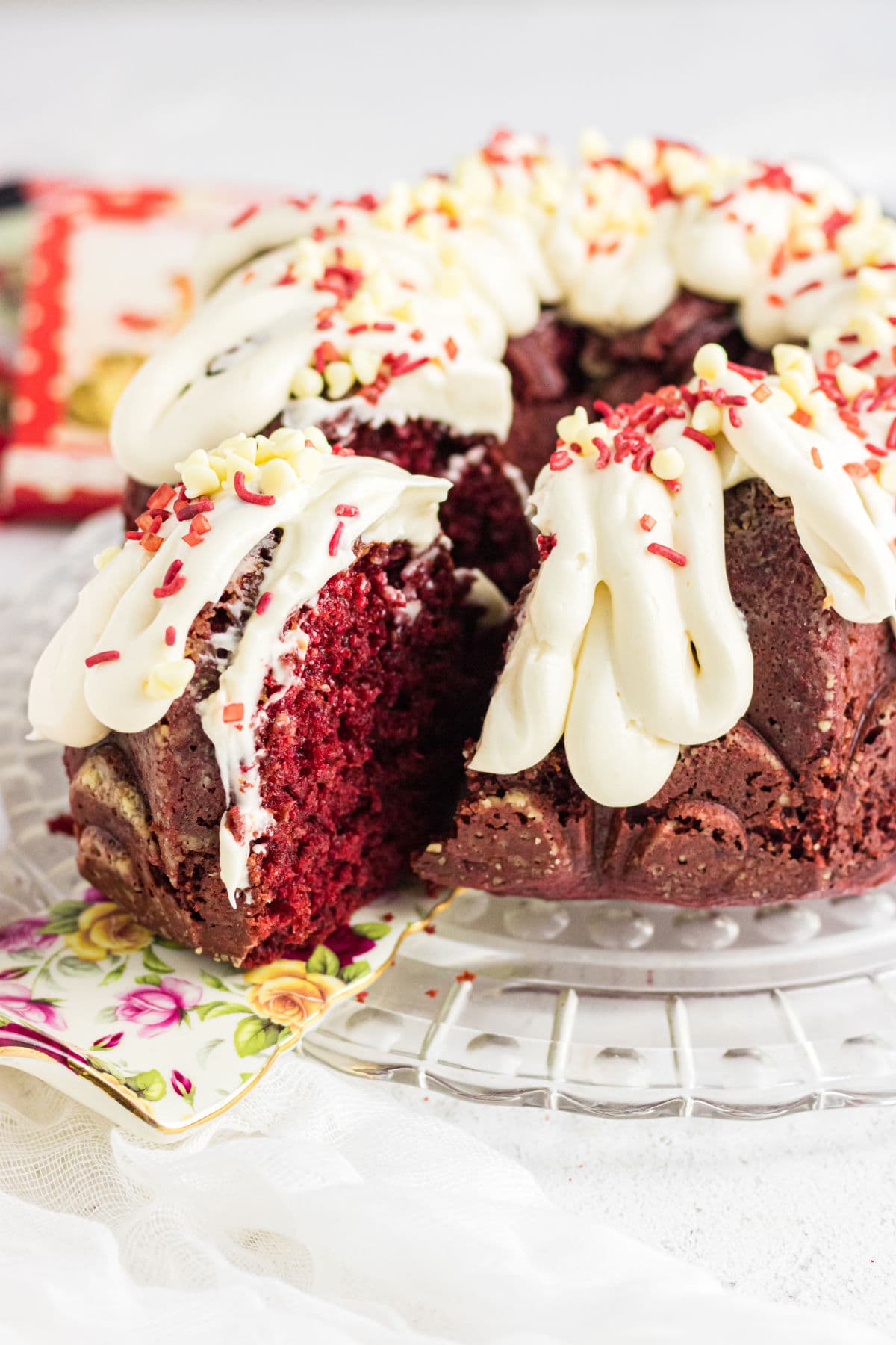 A slice of cake being removed showing the crimson red color.