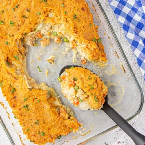 Overhead view of a casserole with a serving removed for the featured image.